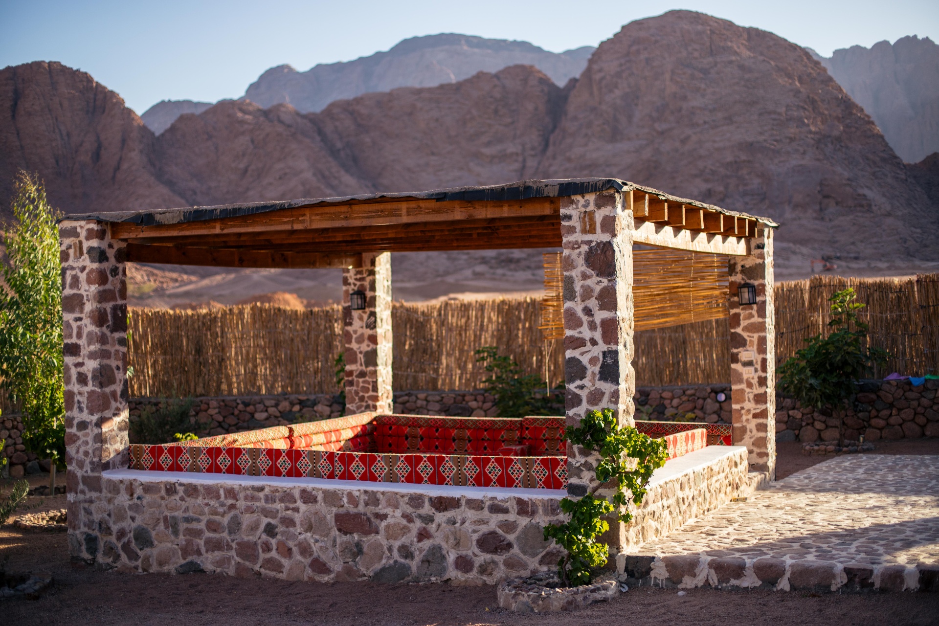 Outdoor Arabian-style seating area with traditional cushions